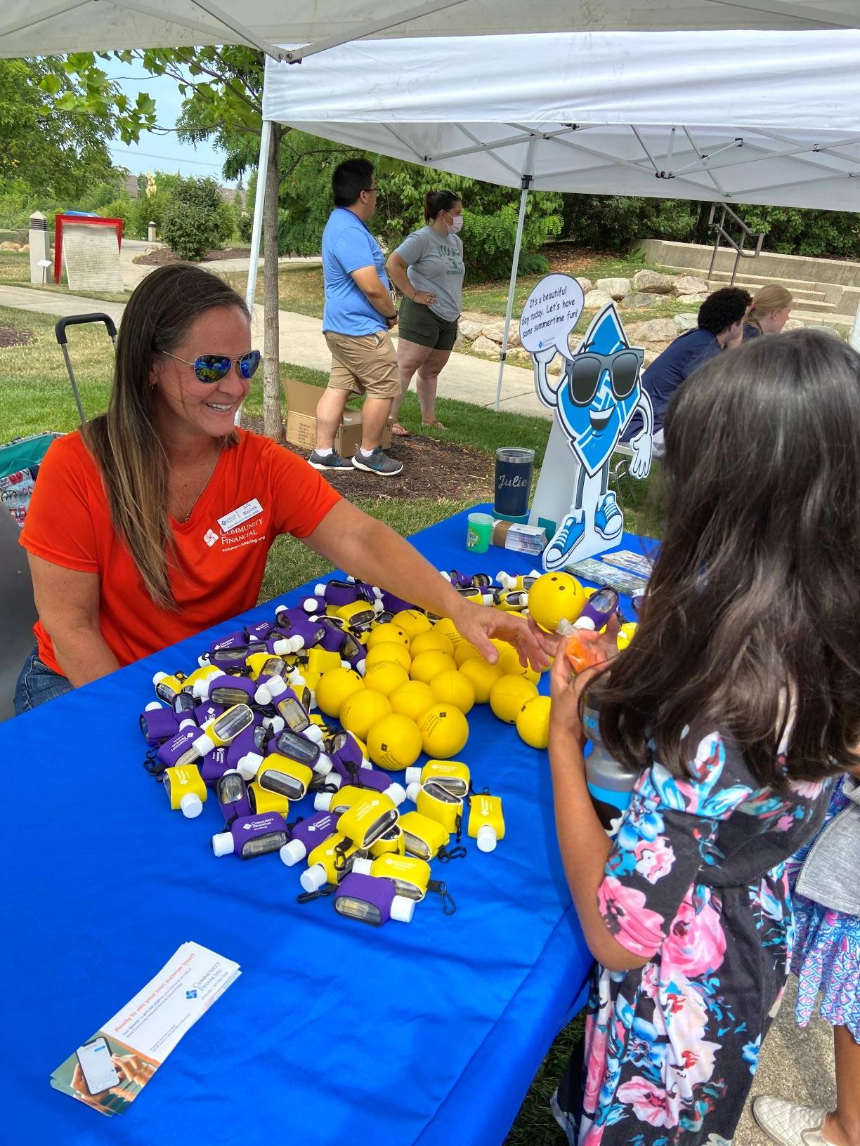 Julie B greets a friend at a Sizzling Summer concert in Novi with plenty of fun things to share!